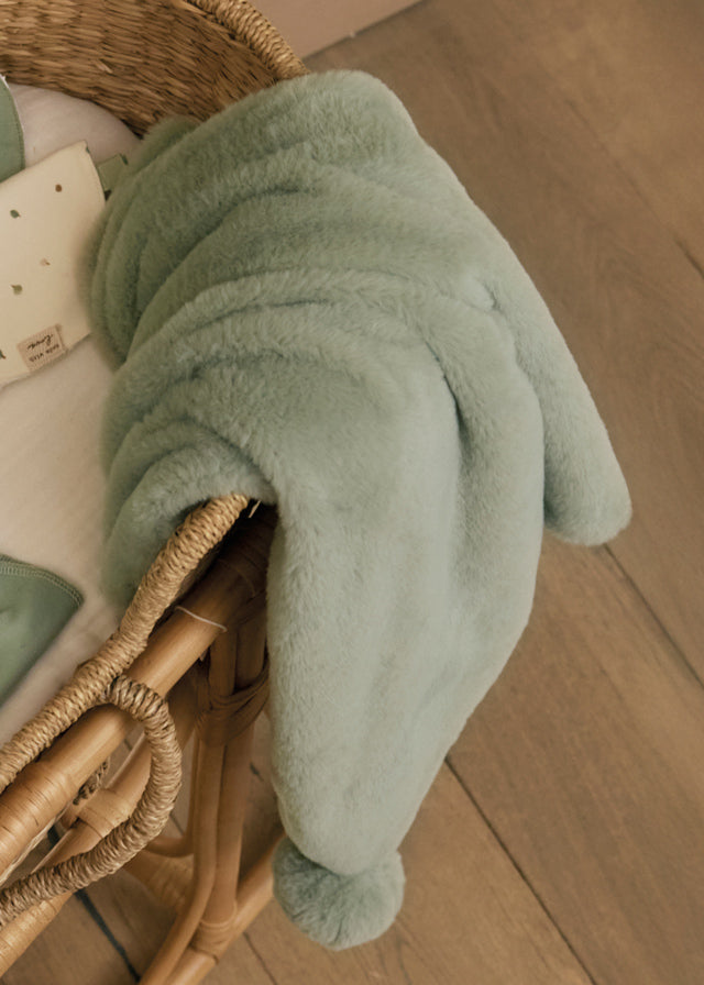 Manta pelo pompones bebé