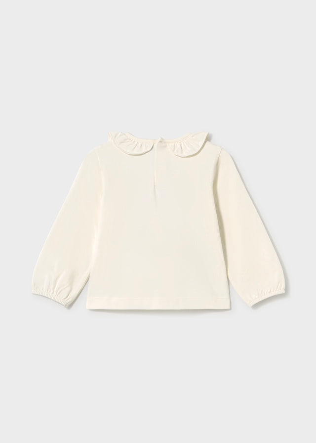 Camiseta cuello volante bebé