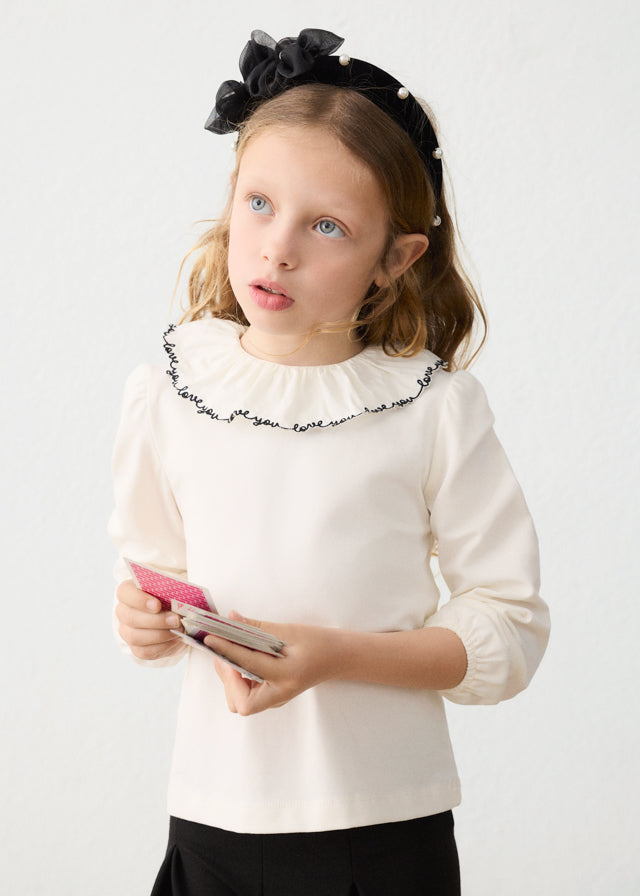 Blusa cuello volante niña