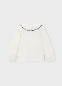 Blusa cuello volante niña