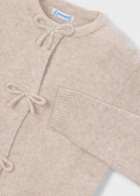 Rebeca tricot lazos niña