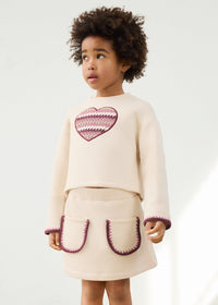 Conjunto falda y sudadera corazón niña