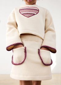 Conjunto falda y sudadera corazón niña