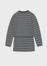 Conjunto de suéter de punto y falda para niña.