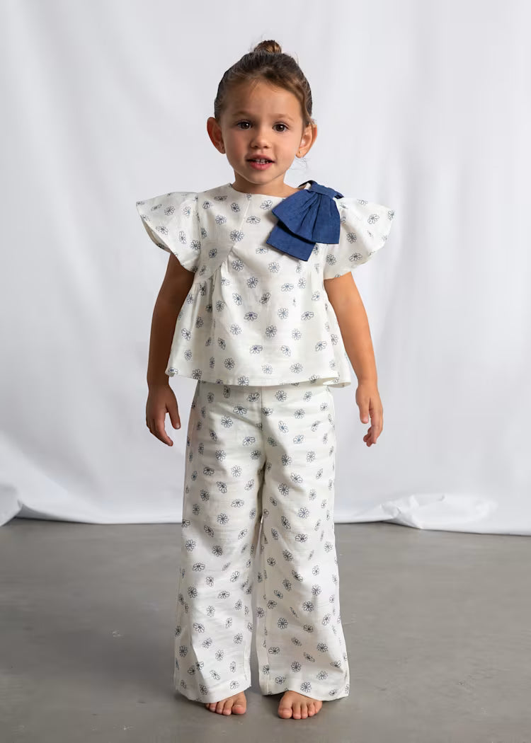 Conjunto pantalón largo y top estampado niña
