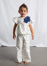 Conjunto pantalón largo y top estampado niña