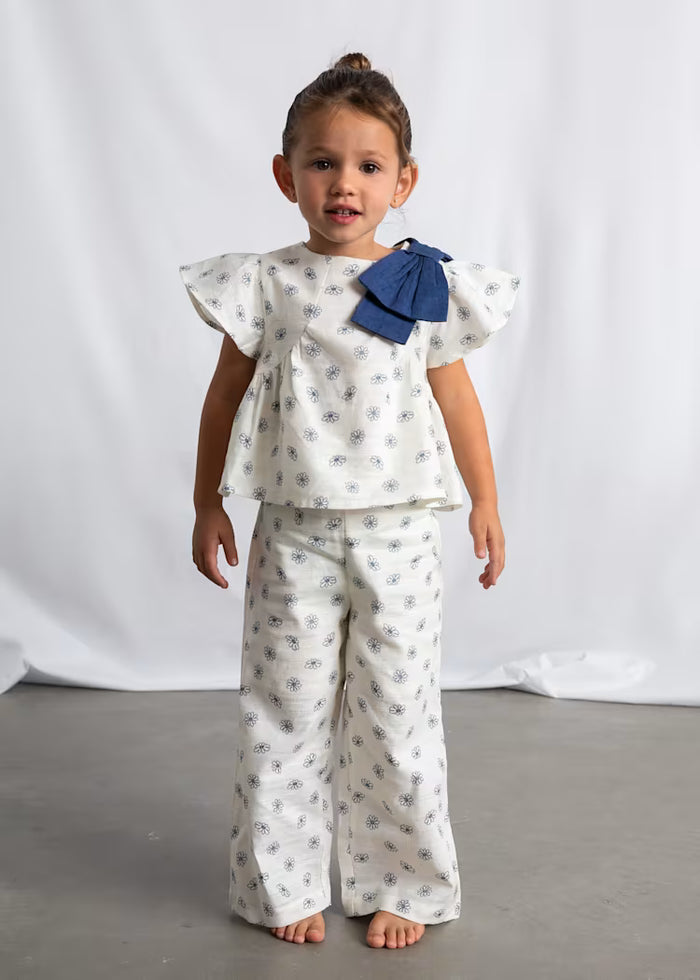 Conjunto pantalón largo y top estampado niña